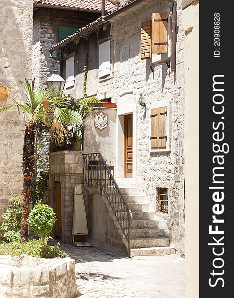 Small city street in Kotor UNESCO town in Montenegro. Small city street in Kotor UNESCO town in Montenegro.