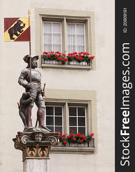 The statue of warrior with the flag of bear, the symbol of Bern in Switzerland. The statue of warrior with the flag of bear, the symbol of Bern in Switzerland.