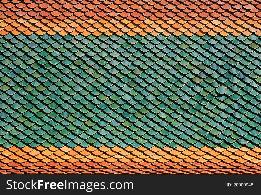 Colorful Tiles of Thai Temple Roof are beautiful