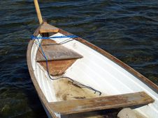 Small Fishing Boat Dory Rowboat On Water Stock Images