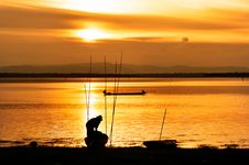 Fisherman Work In Sunset Stock Photo Fisherman Work In Sunset Stock Photo