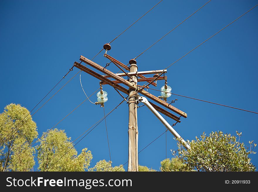 Electricity pole and line shot from the ground up. Electricity pole and line shot from the ground up