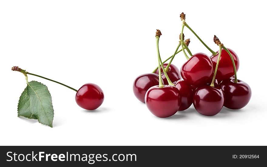 Ripe cherries group and single cherry with leaf on white background