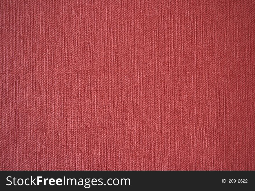 Bright red wallpaper with structure