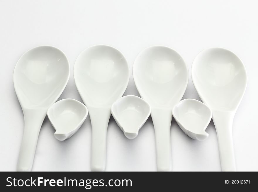 Spoon and ladle on a white background.