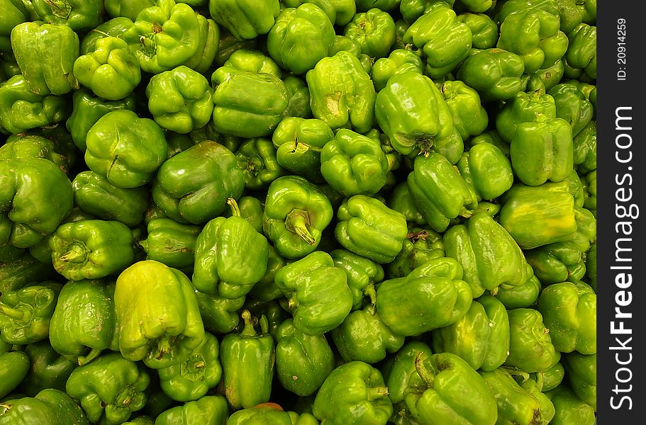 A bunch of green bell pepper.