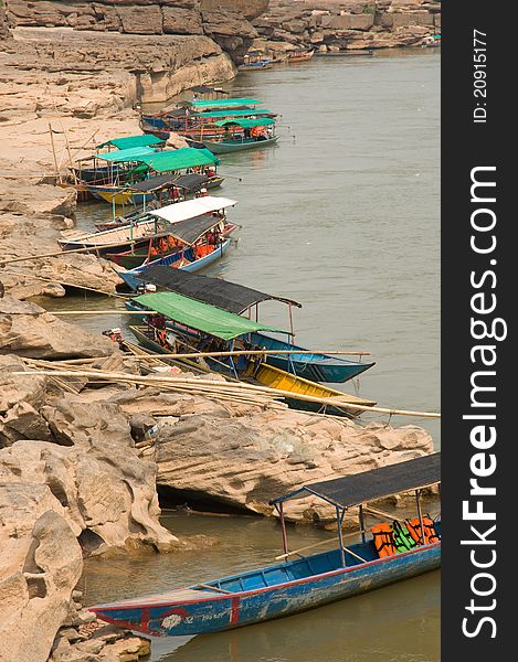 Touring boat to see eroded stone Sampanbok at Mekong river Ubonratchathani province Thailand