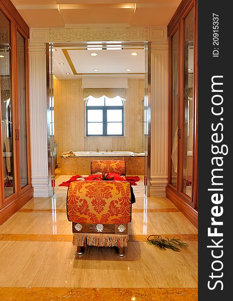 Dressing and bathroom in luxury decorating style, with depth view and functional space.