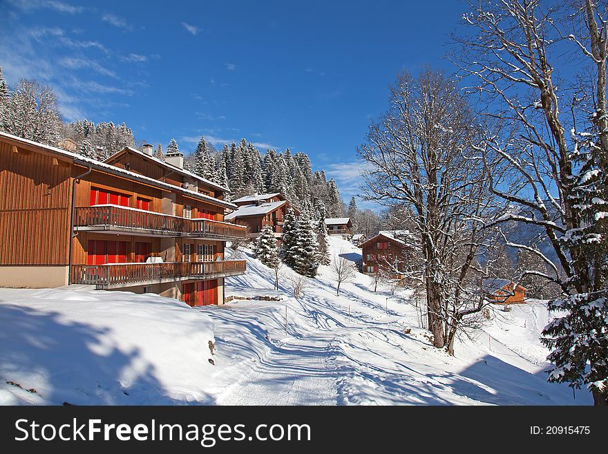 Winter holiday houses in swiss alps