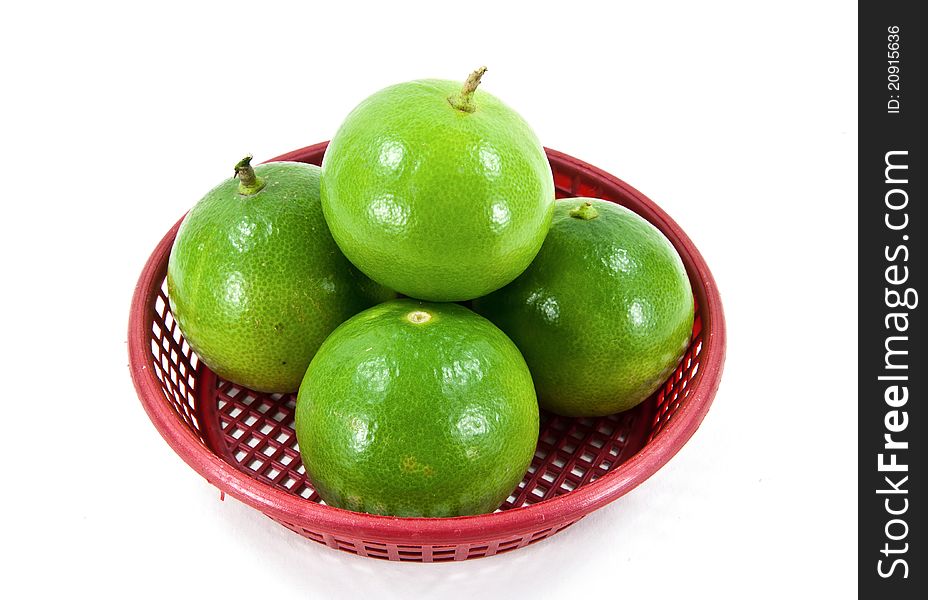 Lime's in a red basket.