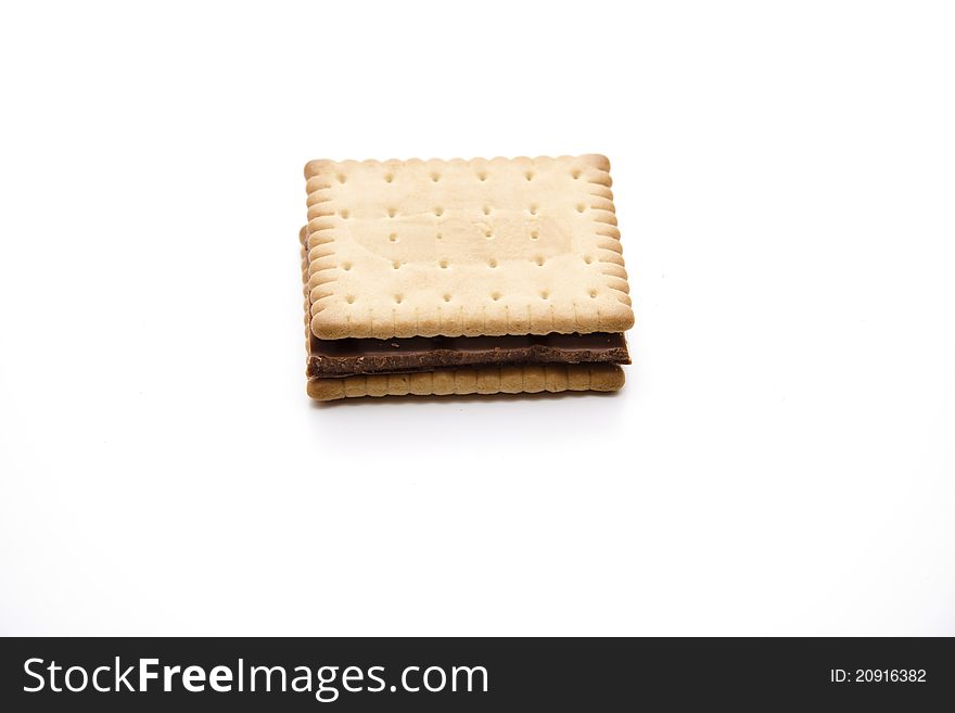 Cookies with chocolate and onto white background