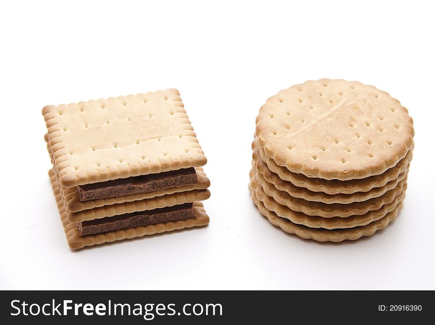 Cookies with chocolate and onto white background
