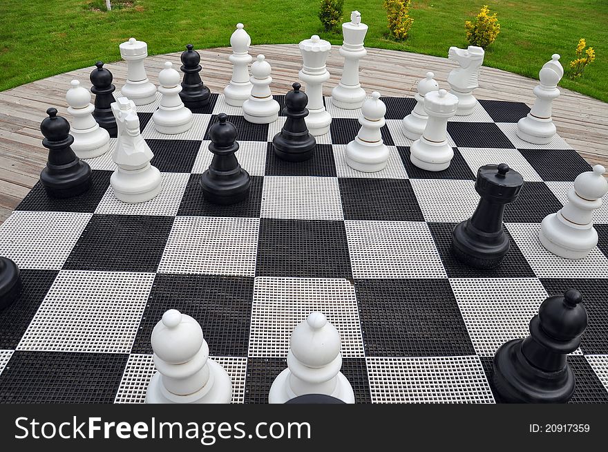 Chess game board on garden