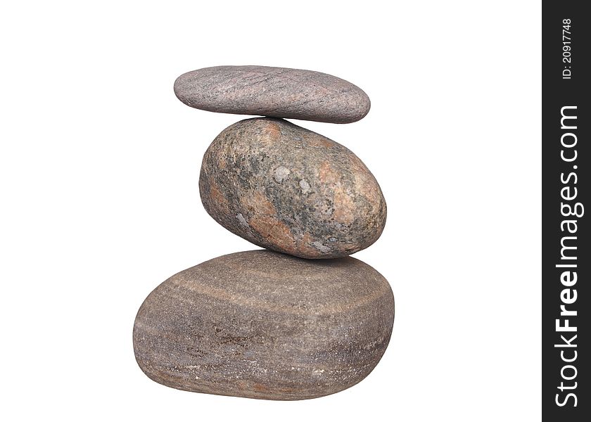 Pyramid with three stones on a white background. Pyramid with three stones on a white background