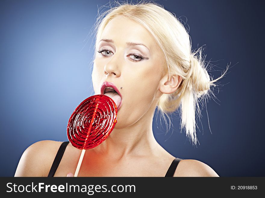 Beautiful Model Licks A Lollipop.