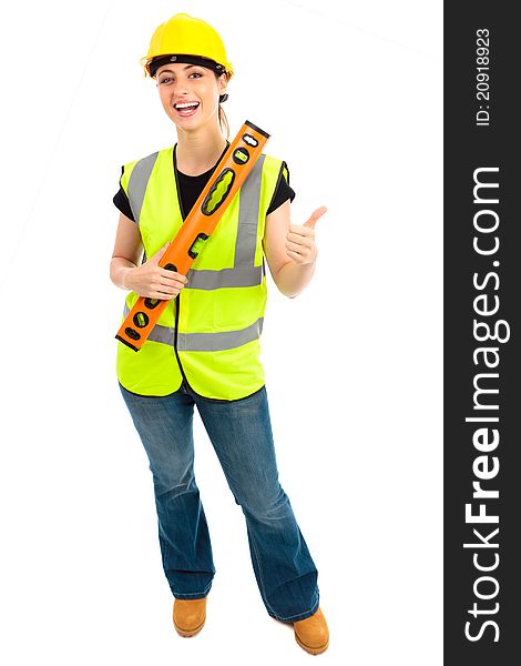 A females dressed in a high visibility jacket holding a spirit level on isloated white background. A females dressed in a high visibility jacket holding a spirit level on isloated white background