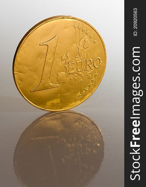 Euro coin on white background macro close up