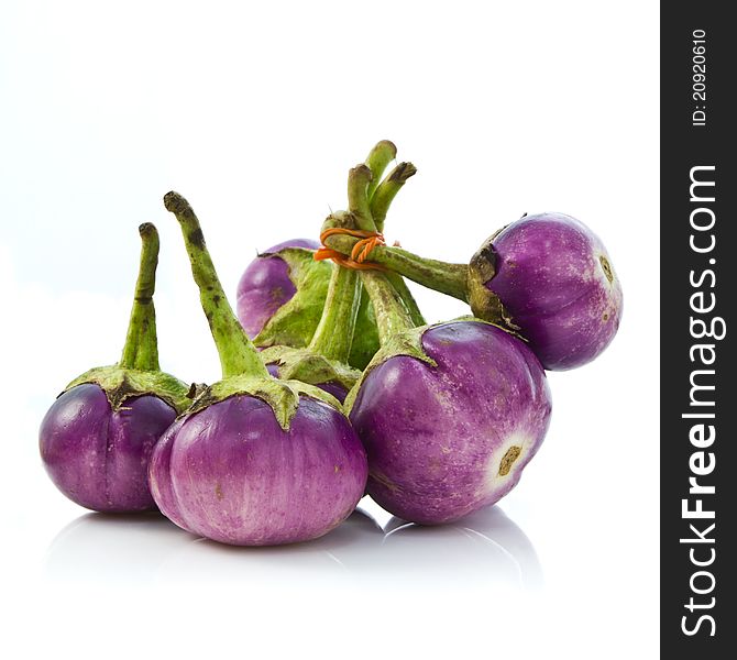 Violet eggplant isolated on white background