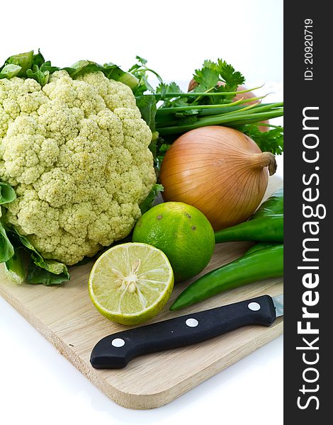 Many kinds of vegetable on chopping board. Many kinds of vegetable on chopping board