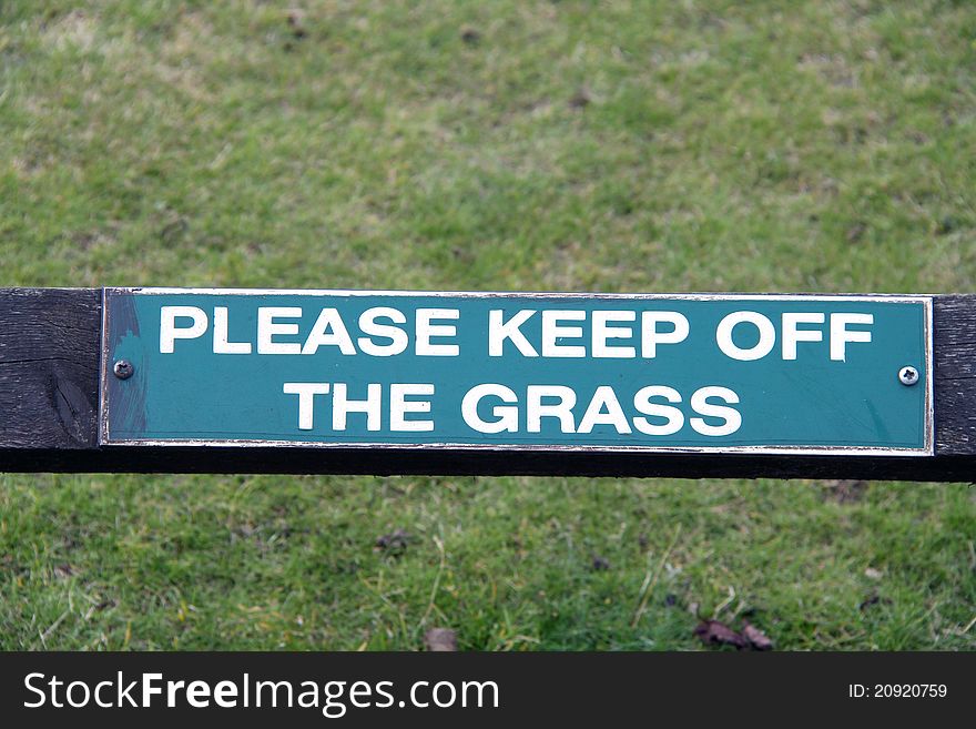 Keep off the grass sign