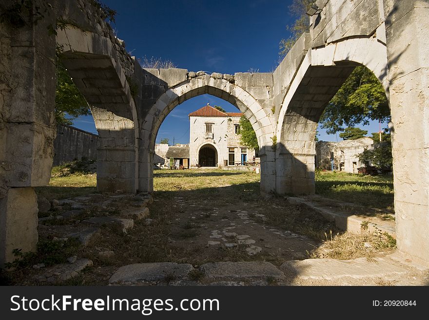 Stonemade arches in the oriental Maskovica khan courtyard. Stonemade arches in the oriental Maskovica khan courtyard