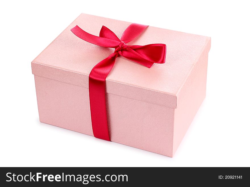 Color photo of a box and red ribbon. Color photo of a box and red ribbon