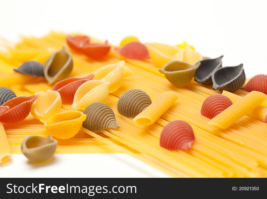 A bunch of colorful pasta in different variations