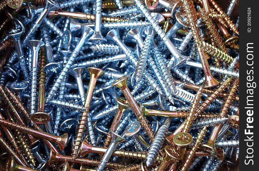 The background consisting of metal chromeplated screws