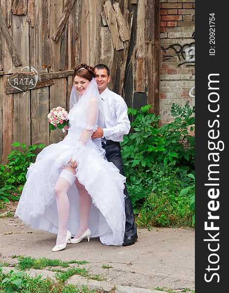 Happy smiling bride and groom. Happy smiling bride and groom