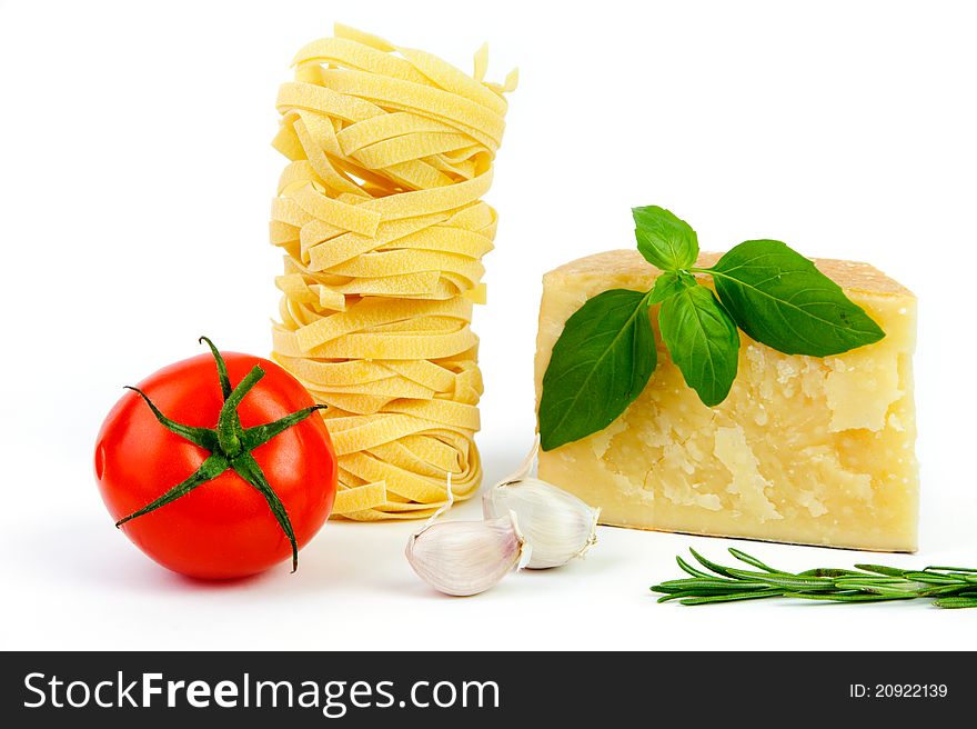 An image of cheese, tomato, pasta, garlic and basil. An image of cheese, tomato, pasta, garlic and basil