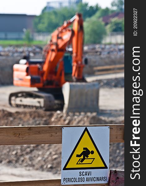 Sign of danger for work in progress (Italian) in a building site. Sign of danger for work in progress (Italian) in a building site