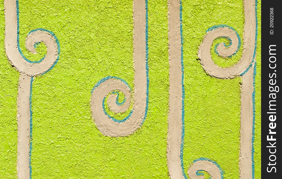 Many long spiral isolated on green wall