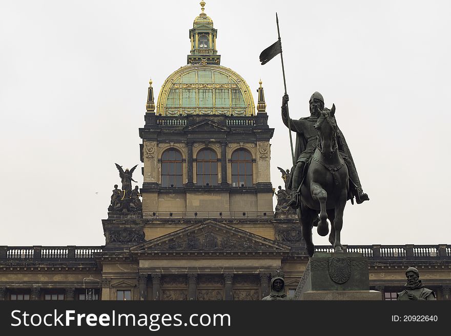 Statue man on a horse and a beautiful building. Statue man on a horse and a beautiful building