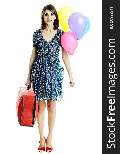 A young beautiful woman with balloons and a bag. A young beautiful woman with balloons and a bag