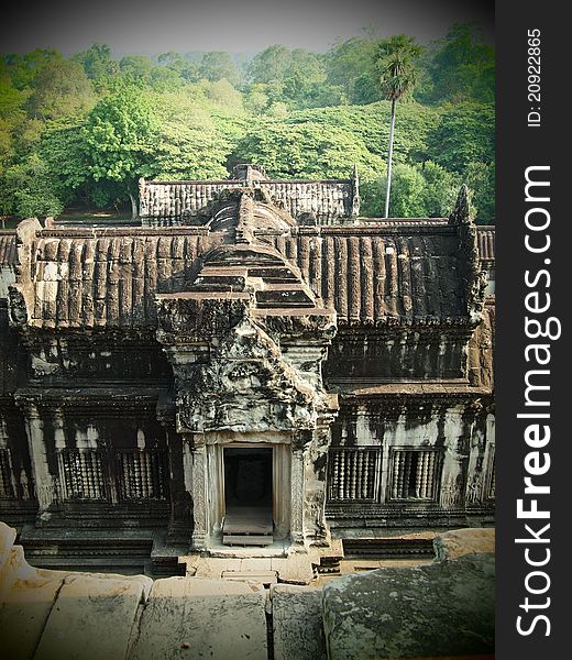 This Gate, which has no stairway, was used by the king and others for mounting and dismounting elephants directly from the gallery. North of the gate is a Khmer inscription recording the erection of a nearby stupa in the 18th Century. This Gate, which has no stairway, was used by the king and others for mounting and dismounting elephants directly from the gallery. North of the gate is a Khmer inscription recording the erection of a nearby stupa in the 18th Century.