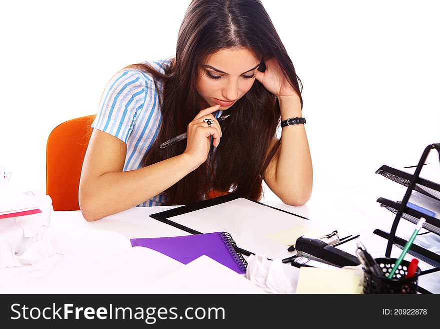 Young and beautiful student girl at the desk