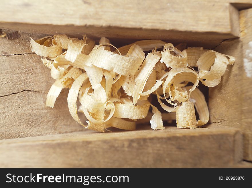 Wooden chips into old carpenter's wood planer