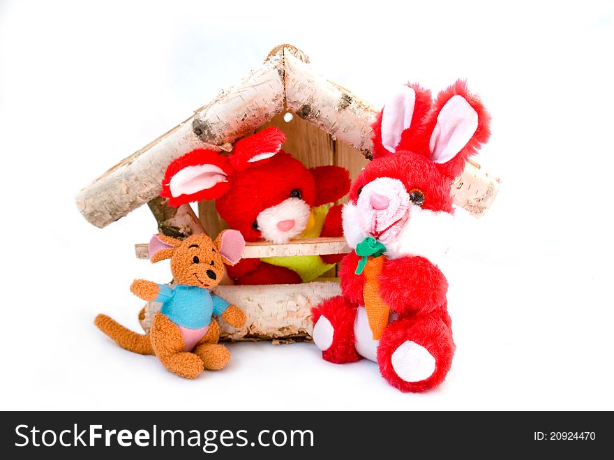 Toys in a miniature rustic house