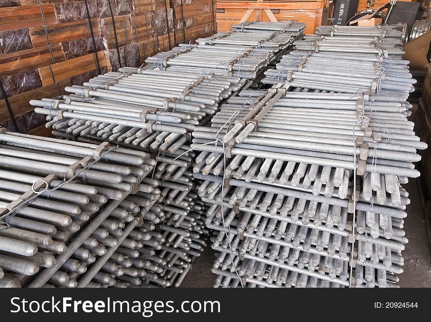 Pile of machine bolts in stockpile for distribution