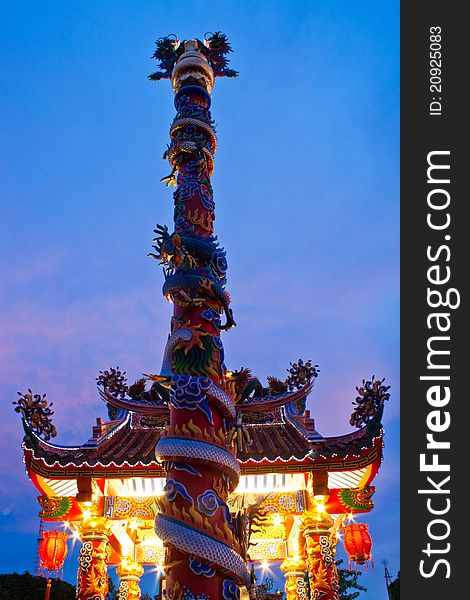 Chinese style pavilion and dragon statue at sunset sky. Chinese style pavilion and dragon statue at sunset sky