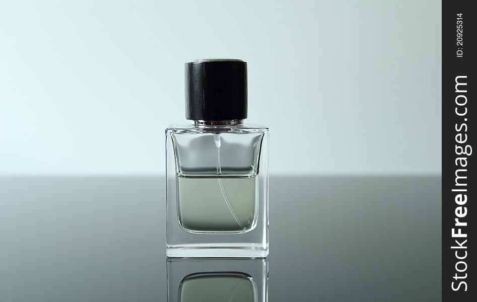 Unmarked front view of a glass cologne bottle. Unmarked front view of a glass cologne bottle.