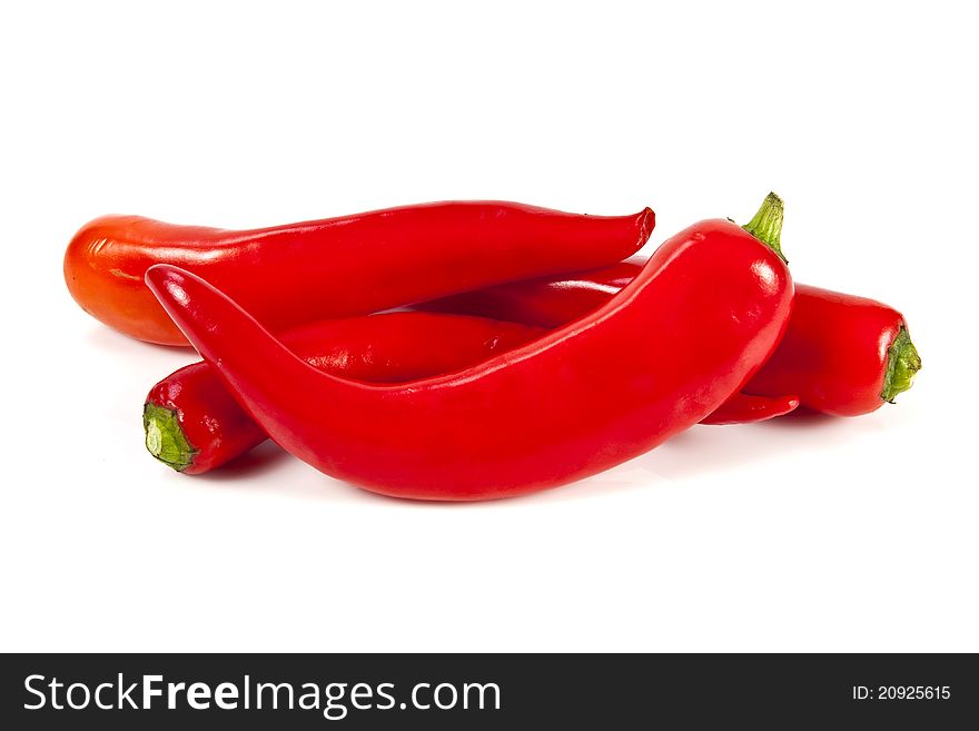 Fresh red hot pepper on a white background. Fresh red hot pepper on a white background
