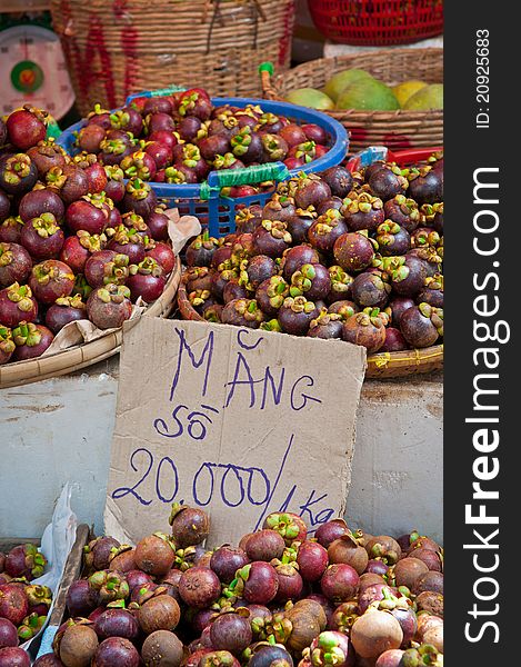 Fresh picked mangosteens for sale in a market in Vietnam. Fresh picked mangosteens for sale in a market in Vietnam.