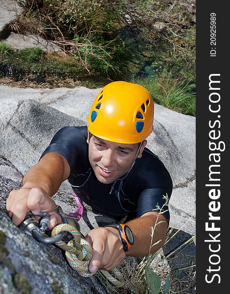 Men prepering to rappeling on waterfall. Men prepering to rappeling on waterfall