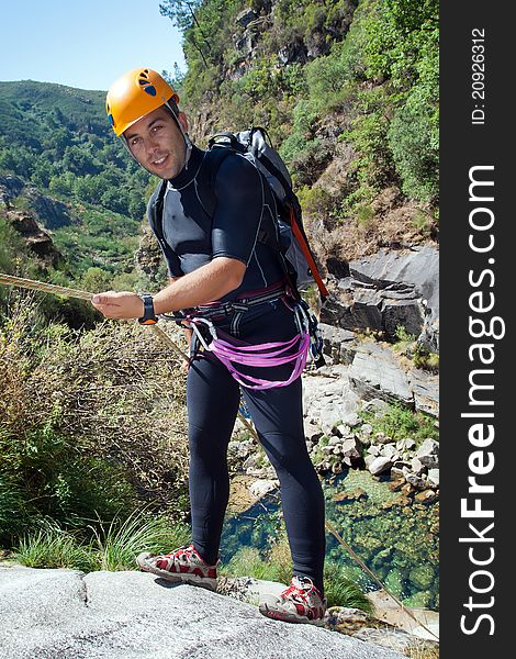 Men Descending Waterfall