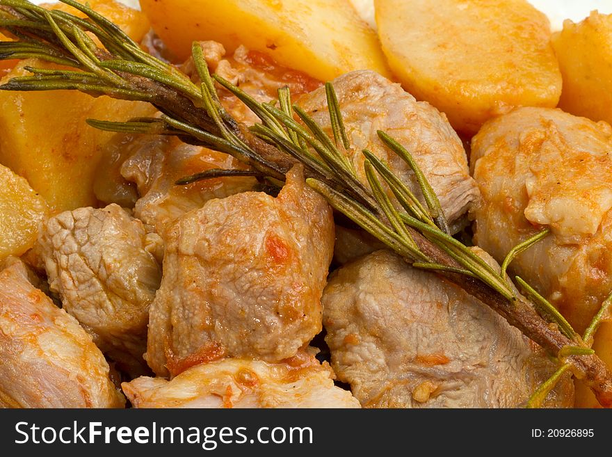 Meat stew with potatoes and rosemary