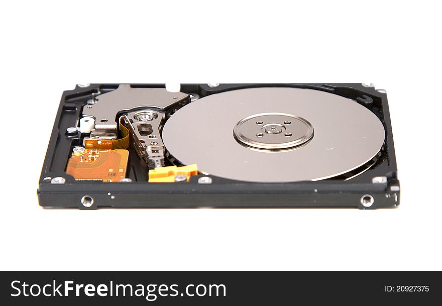 Inside of a SATA hard drive from a laptop. Inside of a SATA hard drive from a laptop