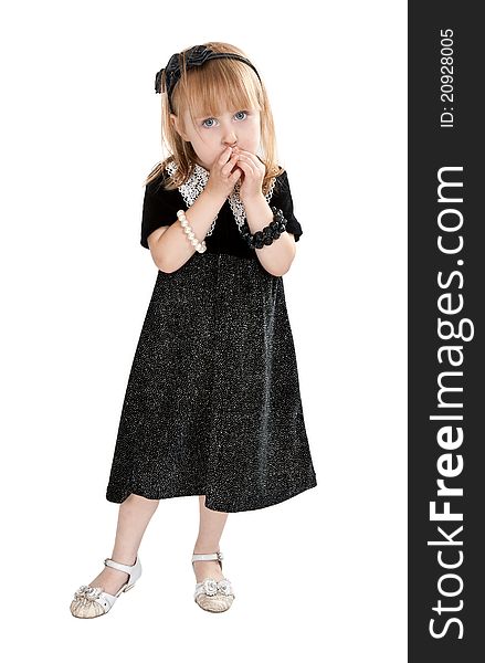 Little girl in a dress on a white background