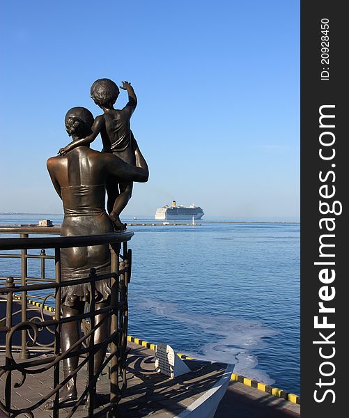 Woman with child statue in odessa marina
