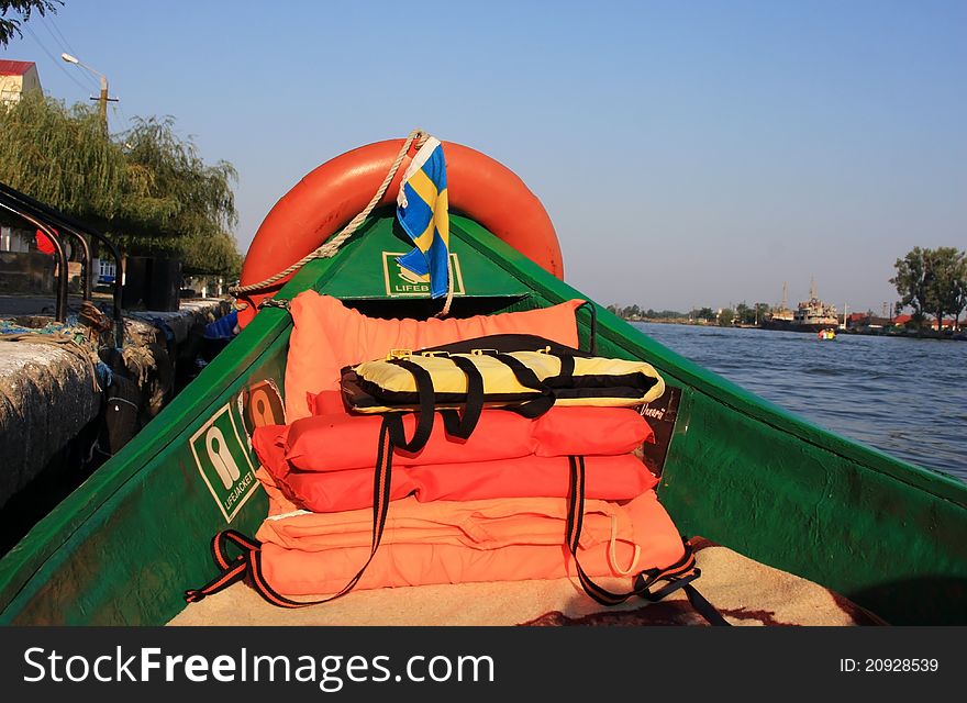 This image represents a stock of lifebuoy on a small boat. This image represents a stock of lifebuoy on a small boat.